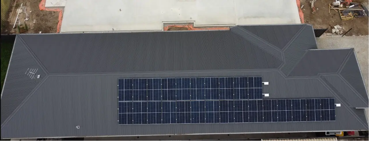 Long commercial roof with solar panels